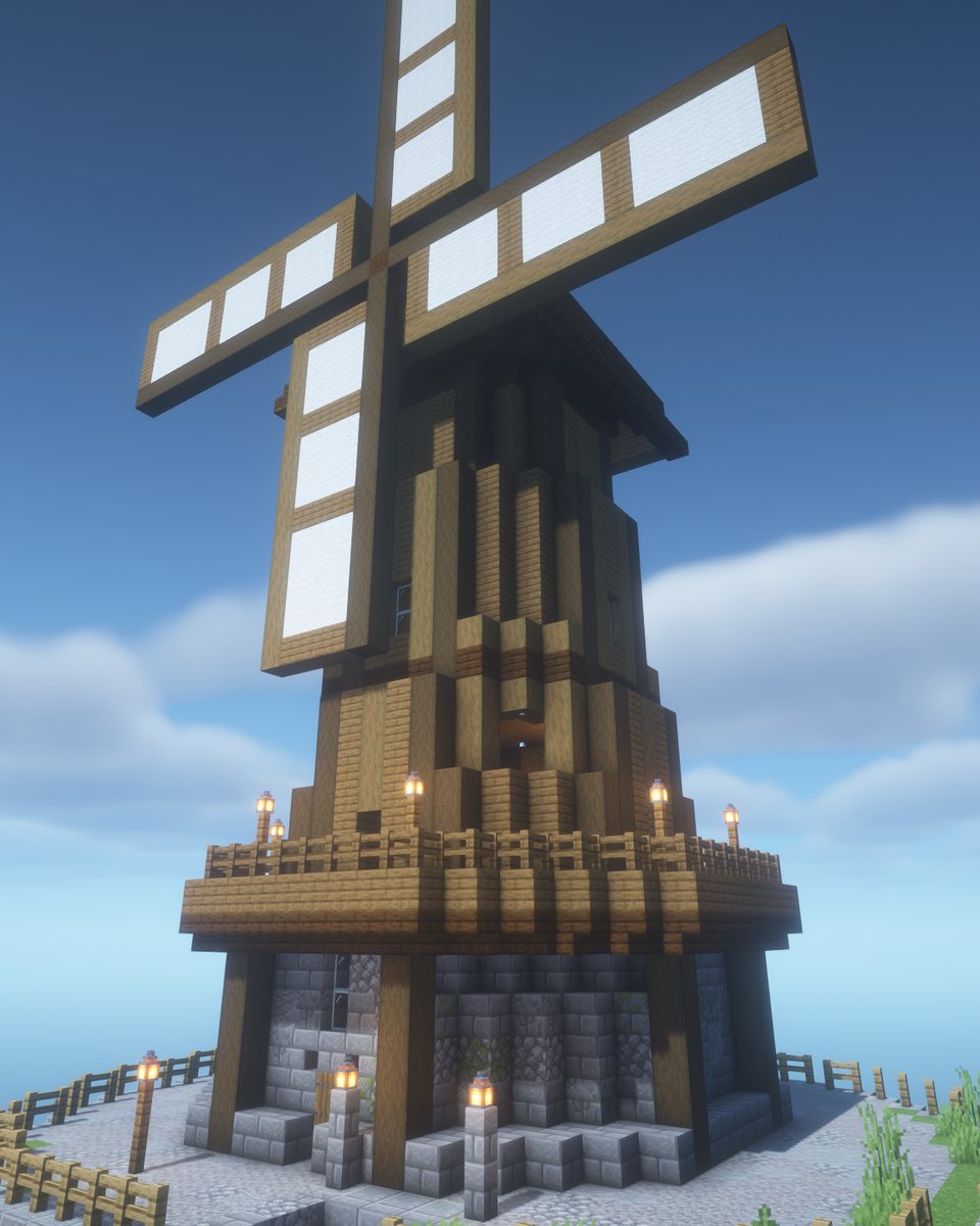 The windmill up close, with its lattice sails and the lantern gallery